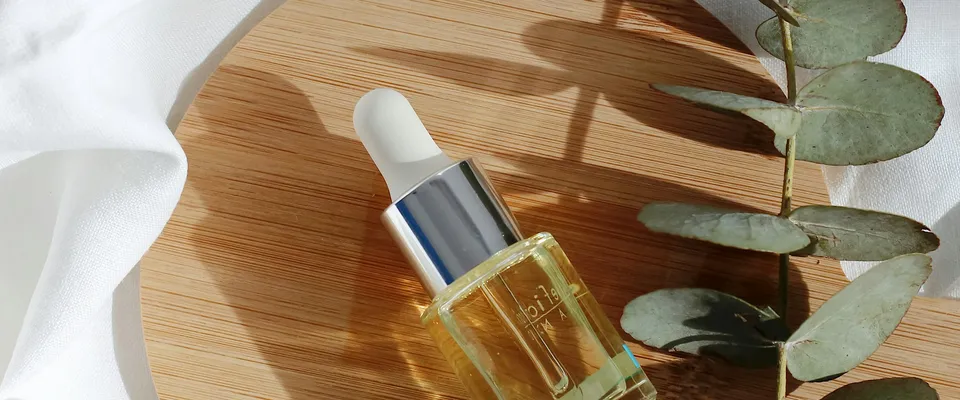 Botanical face oil with eucalyptus leaves