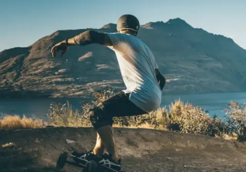 An Evolve rider on a mountain trail